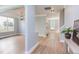 Bright foyer leads to living spaces with modern lighting and light gray walls at 12320 Tetons Ct, Durham, NC 27703