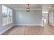 This living room has wood floors, light gray walls, white trim and lots of natural light at 12320 Tetons Ct, Durham, NC 27703