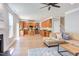 Open-concept living room and kitchen featuring modern decor and stainless steel appliances at 12320 Tetons Ct, Durham, NC 27703