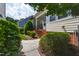 Charming backyard exterior with patio and lush landscaping, perfect for relaxation at 1304 Rodessa Run, Raleigh, NC 27607