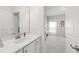 Bright bathroom features a white vanity with modern fixtures at 1304 Rodessa Run, Raleigh, NC 27607