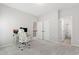 Bright bedroom features neutral colors, carpeted floor, and a workspace at 1304 Rodessa Run, Raleigh, NC 27607