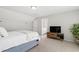 Cozy bedroom with a comfortable king bed and a modern media center at 1304 Rodessa Run, Raleigh, NC 27607