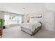 Bright bedroom with a comfortable king bed, soft carpet, and lots of natural light at 1304 Rodessa Run, Raleigh, NC 27607