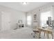 Bright bedroom features neutral colors, carpeted floor and a workspace at 1304 Rodessa Run, Raleigh, NC 27607