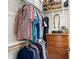 Walk-in closet with built-in shelving and rods at 1304 Rodessa Run, Raleigh, NC 27607