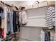 Walk-in closet with shelving and clothing racks at 1304 Rodessa Run, Raleigh, NC 27607