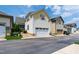 Two-story home showcasing a well-maintained white garage and neutral color scheme at 1304 Rodessa Run, Raleigh, NC 27607