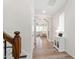 Upstairs hallway with stairs and living area at 1304 Rodessa Run, Raleigh, NC 27607
