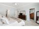 Well-lit main bedroom with ensuite and closet access, and plenty of dresser storage at 1304 Rodessa Run, Raleigh, NC 27607