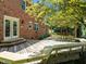 Spacious back deck, accessible from the main house, and featuring built-in benches and pergola at 1304 Sandpiper Ct, Raleigh, NC 27615