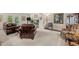 Comfortable living room featuring plush seating, neutral carpeting, and ample space for entertaining at 1304 Sandpiper Ct, Raleigh, NC 27615