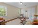 Cozy living room with a comfortable seating area, natural light, and ample closet space at 1304 Sandpiper Ct, Raleigh, NC 27615
