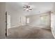 Primary bedroom featuring vaulted ceilings, neutral carpeting, and plenty of natural light at 132 Ryder Cup Cir, Raleigh, NC 27603