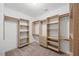 Walk-in closet with custom shelving and clothing racks, providing plenty of storage at 132 Ryder Cup Cir, Raleigh, NC 27603