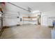 Spacious garage with ample storage and shelving space available for organization at 132 Ryder Cup Cir, Raleigh, NC 27603