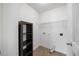 Laundry room with shelving and hookups for a washer and dryer at 132 Ryder Cup Cir, Raleigh, NC 27603