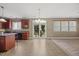 An open living room with access to the backyard, light-colored walls, and neutral flooring at 132 Ryder Cup Cir, Raleigh, NC 27603