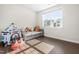 bedroom with hardwood floors, ample natural light, and fun decor at 132 Yellow River Way, Garner, NC 27529