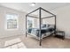 Charming bedroom with ample natural light, soft carpeting, and modern design, creating a serene and inviting space at 132 Yellow River Way, Garner, NC 27529