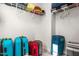 Spacious walk-in closet with wire shelving and neatly organized luggage at 132 Yellow River Way, Garner, NC 27529