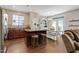 Bright kitchen featuring an island, breakfast bar and built in hutch at 137 Palmdale Ct, Holly Springs, NC 27540