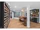 Basement featuring a wine cellar, bar area with seating, and a full bar, great for entertaining guests at 1504 Hemlock Hill Dr, Durham, NC 27703