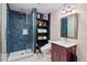 Stylish bathroom with a glass-enclosed shower and custom shelving at 1504 Hemlock Hill Dr, Durham, NC 27703