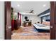 Comfortable bedroom featuring a stylish rug, a workspace, and large bed at 1504 Hemlock Hill Dr, Durham, NC 27703