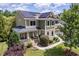 Inviting two-story home with solar panels, front porch, and landscaped front yard at 1504 Hemlock Hill Dr, Durham, NC 27703