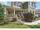 Charming home with a welcoming front porch and beautiful landscaping at 1504 Hemlock Hill Dr, Durham, NC 27703
