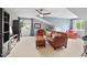 Living area with carpet, neutral paint, skylight, and views of the exterior at 1504 Hemlock Hill Dr, Durham, NC 27703