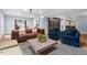 Inviting living room with comfortable seating, chic rug, and stylish furnishings at 1504 Hemlock Hill Dr, Durham, NC 27703