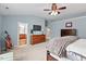 Cozy bedroom featuring neutral tones, carpeted floor, and an ensuite bathroom at 1504 Hemlock Hill Dr, Durham, NC 27703