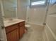 Full bathroom featuring a single vanity, and a tub-shower combo at 160 Inverness St, Zebulon, NC 27597