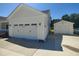 Close up of attached two car garage, with matching one car garage to the side at 160 Inverness St, Zebulon, NC 27597