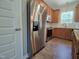 Modern kitchen features stainless steel appliances, updated countertops, and ample storage space at 160 Inverness St, Zebulon, NC 27597