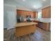 Spacious kitchen with stainless appliances, granite counters and island with a modern design at 160 Inverness St, Zebulon, NC 27597