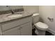 Compact bathroom with granite countertop and modern fixtures, maximizing space efficiency at 185 Bourne Dr, Franklinton, NC 27525