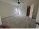 Bedroom features large window with natural light and closet space at 185 Bourne Dr, Franklinton, NC 27525