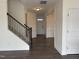 Inviting foyer showcasing staircase and detailed trim work, offering a warm welcome at 185 Bourne Dr, Franklinton, NC 27525