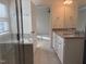 Main bathroom features double vanity, large soaking tub and a glass shower at 185 Bourne Dr, Franklinton, NC 27525
