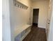 Well-organized mudroom with built-in storage and hooks, keeping clutter at bay at 185 Bourne Dr, Franklinton, NC 27525