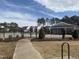 View of the community pool and clubhouse, perfect for relaxing and entertaining at 185 Bourne Dr, Franklinton, NC 27525