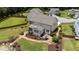 Aerial shot of a backyard featuring stone-lined gardens and covered porch at 185 Twilight Trl, Willow Springs, NC 27592
