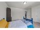 Bedroom with soft carpet, built-in shelving, and bright natural light at 185 Twilight Trl, Willow Springs, NC 27592