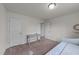 A comfortable bedroom featuring a desk and lots of natural light at 185 Twilight Trl, Willow Springs, NC 27592