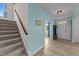 Bright entryway leads to an upstairs staircase and office space, creating a welcoming and functional entrance at 185 Twilight Trl, Willow Springs, NC 27592