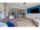 Spacious living room transitions into an open kitchen, offering a perfect blend of living and cooking spaces at 185 Twilight Trl, Willow Springs, NC 27592