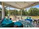 Inviting screened porch area with comfortable seating and relaxing outdoor views at 185 Twilight Trl, Willow Springs, NC 27592